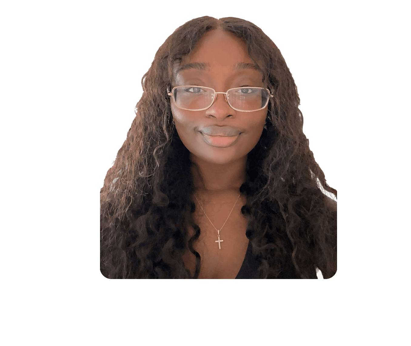 Alexcia Scott smiling at the camera, wearing glasses and a gold cross necklace.